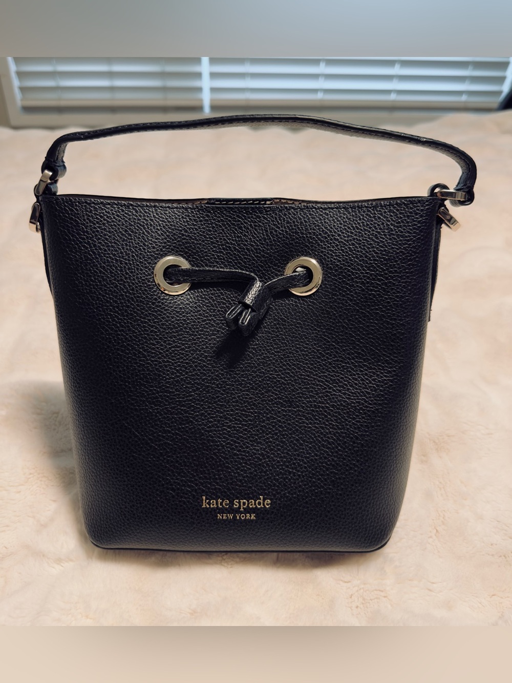 kate spade black pebbled leather drawstring bag